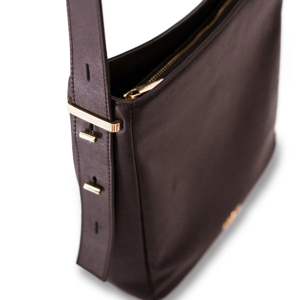 Amana Carla Cross-body Bag side up-close detail view of gold T-push-pin hardware at adjustable cross-body strap.