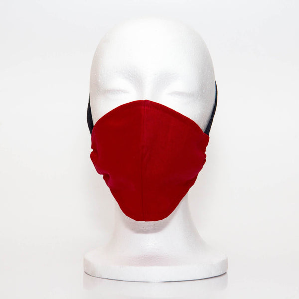 Bright Red Alpha Mask Front View: Solid bright red colour fabric face mask contoured to fit comfortably on your face. This is a 3 layer fabric mask with a middle pocket to insert the filter as the third layer. The bias binding straps is easily adjustable for your comfort and ties behind your head. This mask has a removable filter. This mask an unisex adult fit.