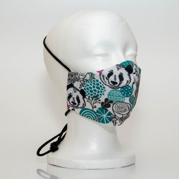 Oltre Print Mask Side View: Teal Panda print. The soft woven strap is easily adjustable around your head for your comfort. 3 Layer fabric mask with a middle filter layer that is contoured to fit comfortably on your face. Mask will fit women and teen girls.