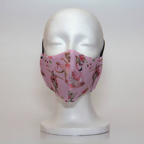 Oltre Print Mask Front View: Ballerina Animals print. Our whimsical ballerina animals are sweet and girly for any dancing girl. 3 Layer fabric mask with a middle filter layer that is contoured to fit comfortably on your face. Mask will fit pre school girls between 3 to 6 years old.