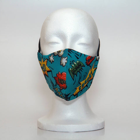 Oltre Print Mask Front View: Comics Blue print. Our fun comics blue print for the comic book lover. Defintely a print that will make you smile. 3 Layer fabric mask with a middle filter layer that is contoured to fit comfortably on your face. Mask will fit teen boy from 12 years and older.